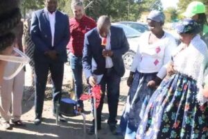 Handing over water connection project